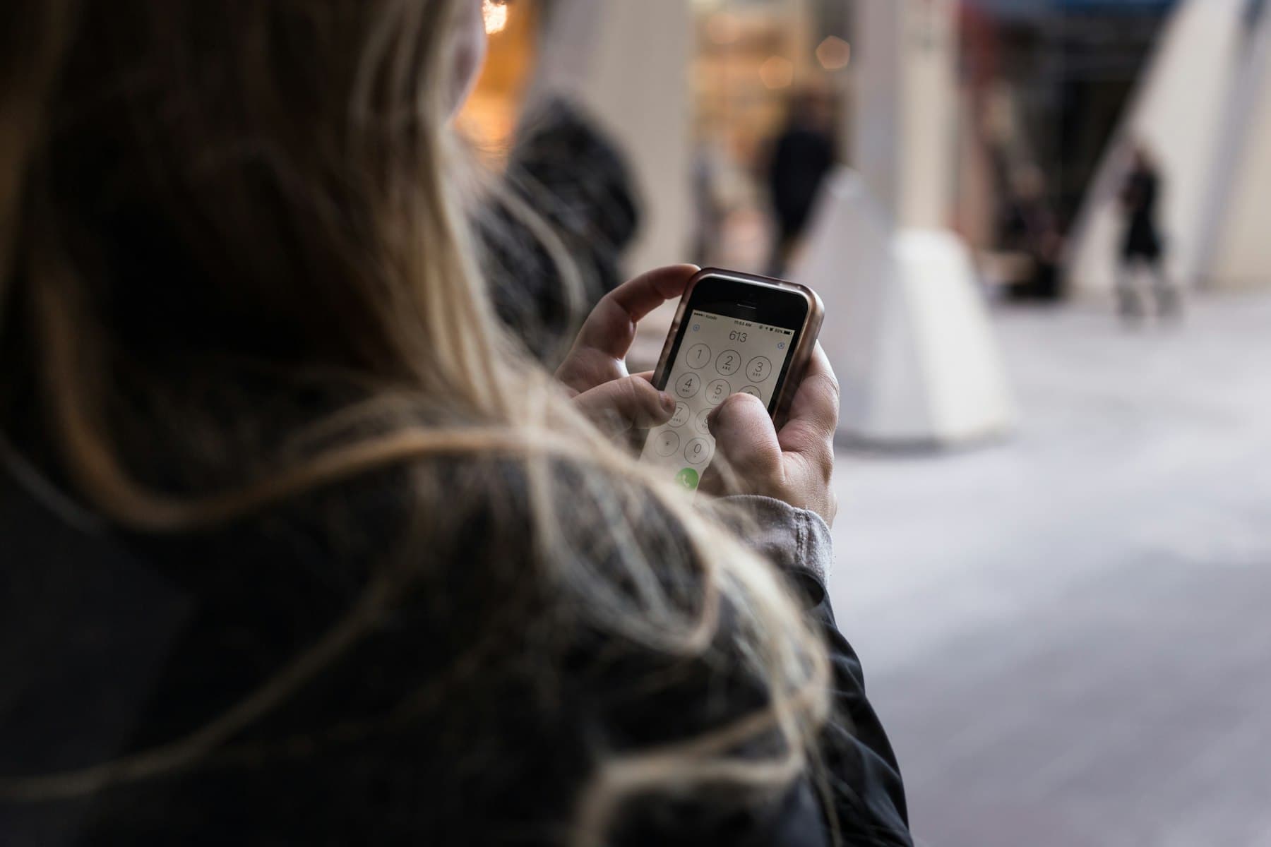 A person unlocking a smartphone