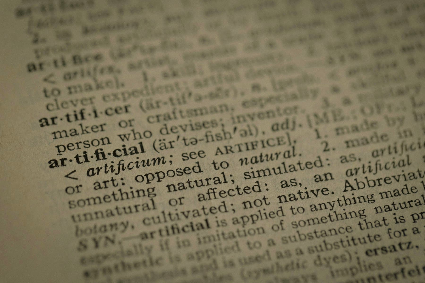 Close-up of an open book with text on the page